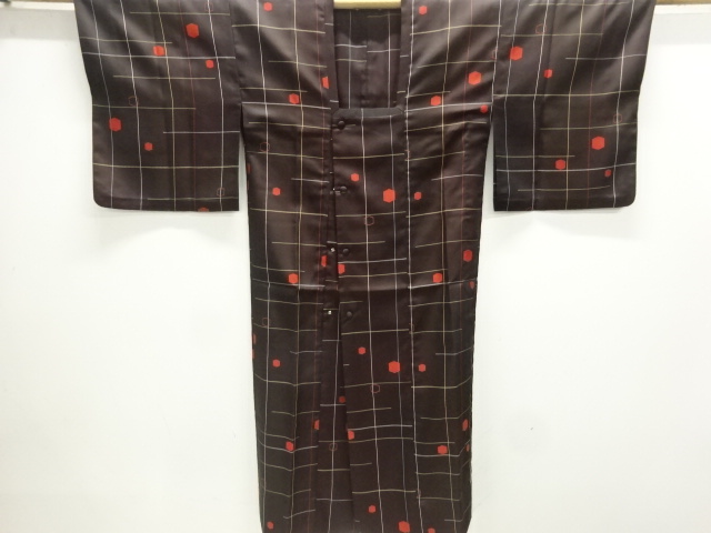 乱れ格子に亀甲模様織出し雨コート